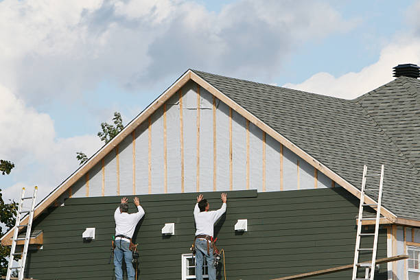 Professional Siding Installation technician working in Baden, PA